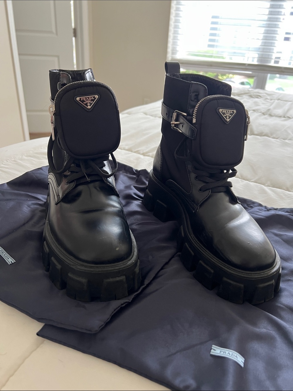Prada Black Leather Lug-Sole Combat Boots with Detachable Pouch